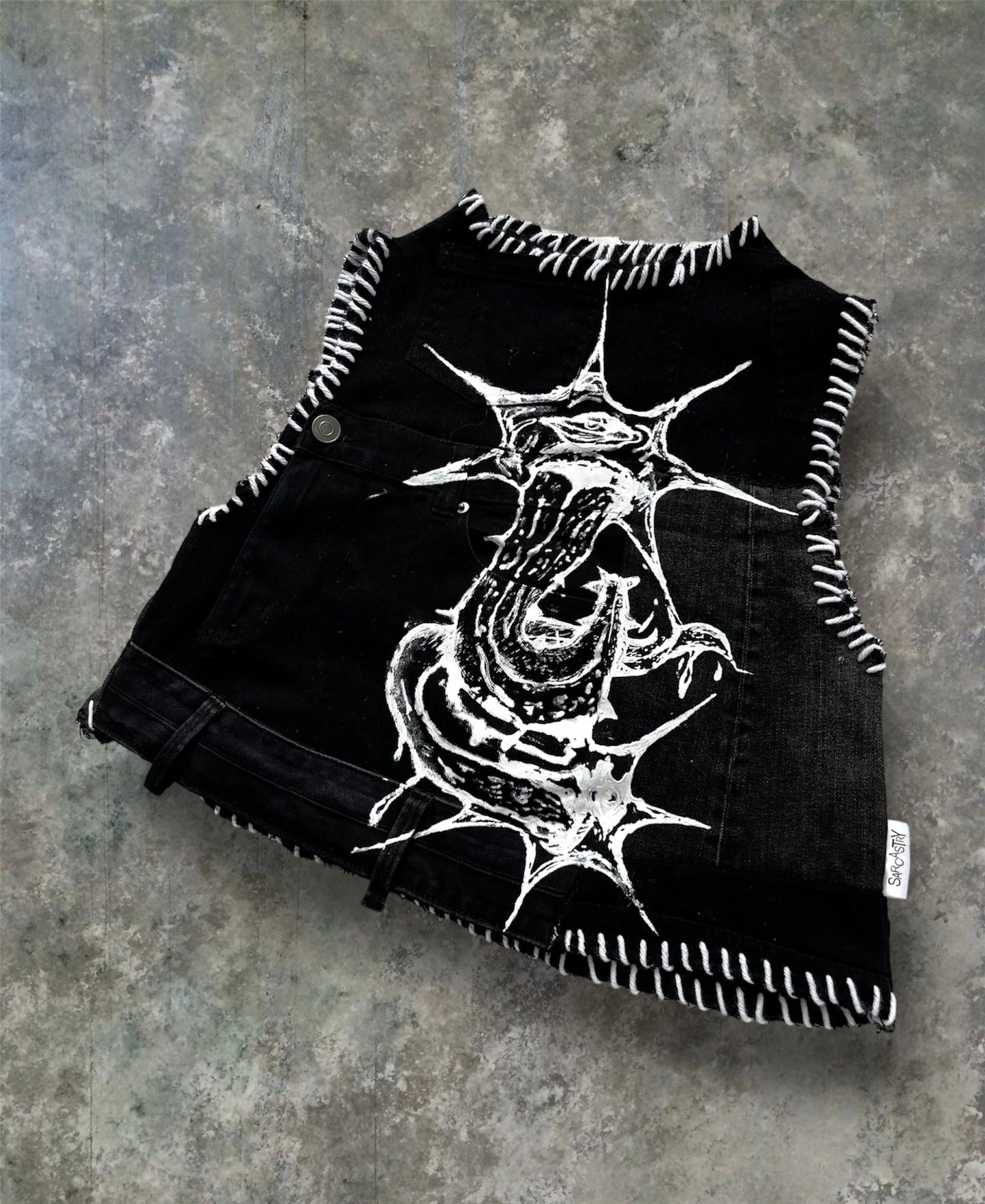 Upcycled denim top with print and embroidery