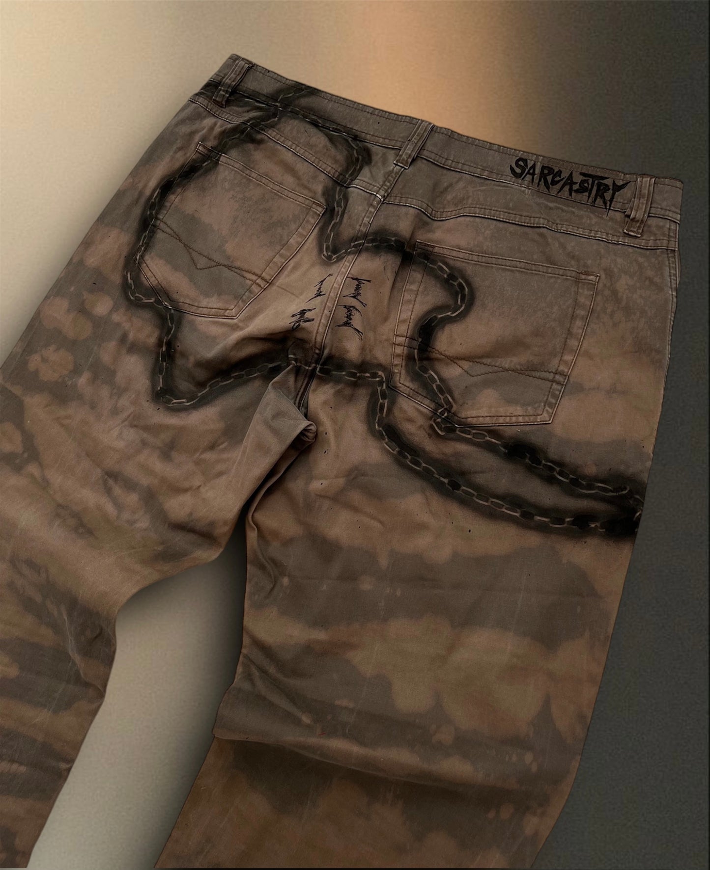 “Kiss the ground” hand painted trousers