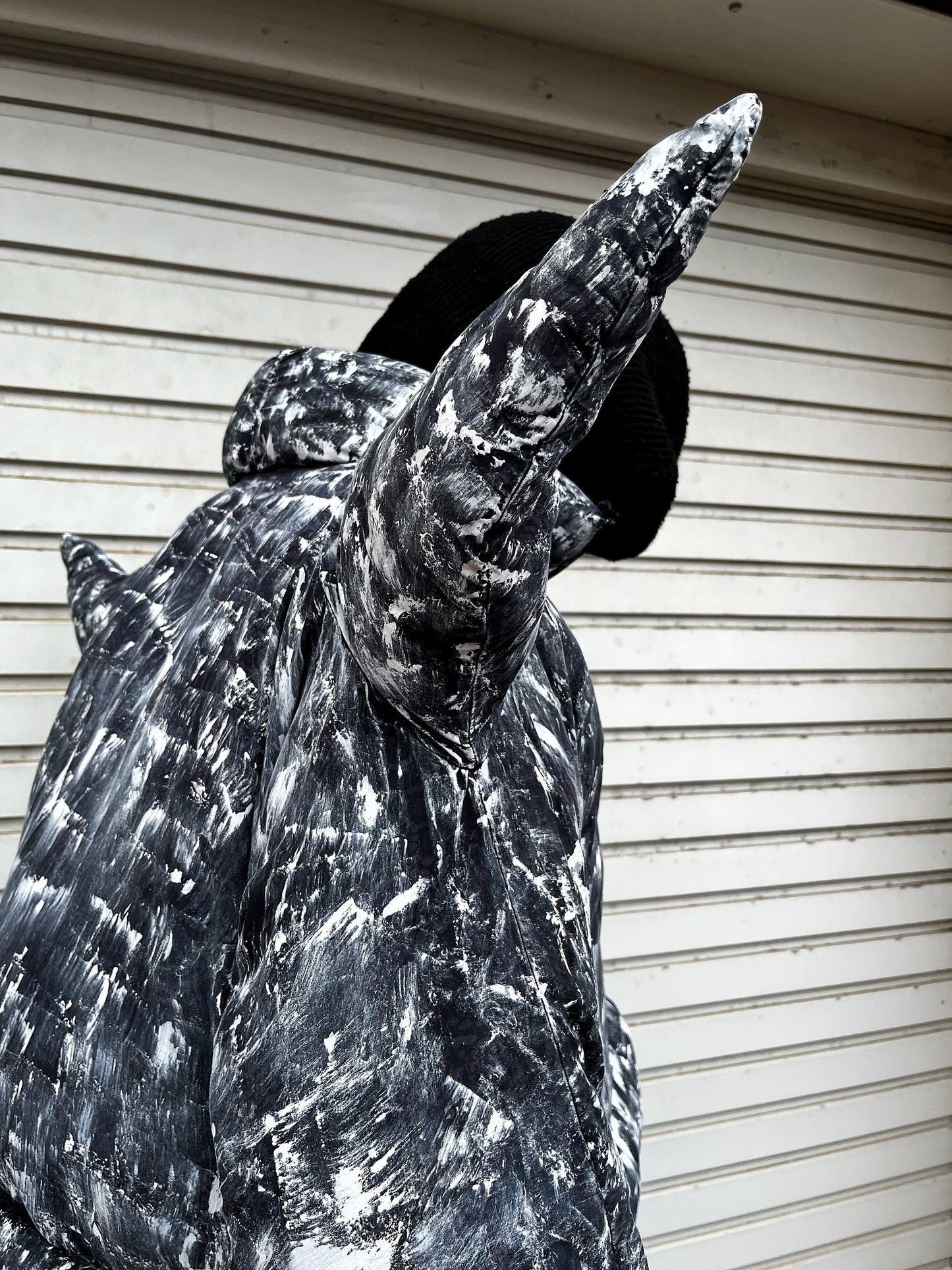 Puffer jacket with spikes made of old duvet