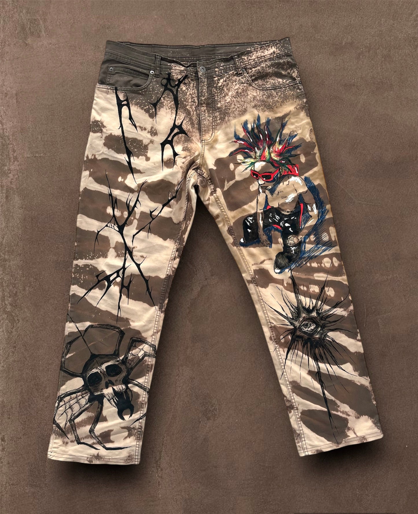 “Skull punk” bleached hand painted trousers