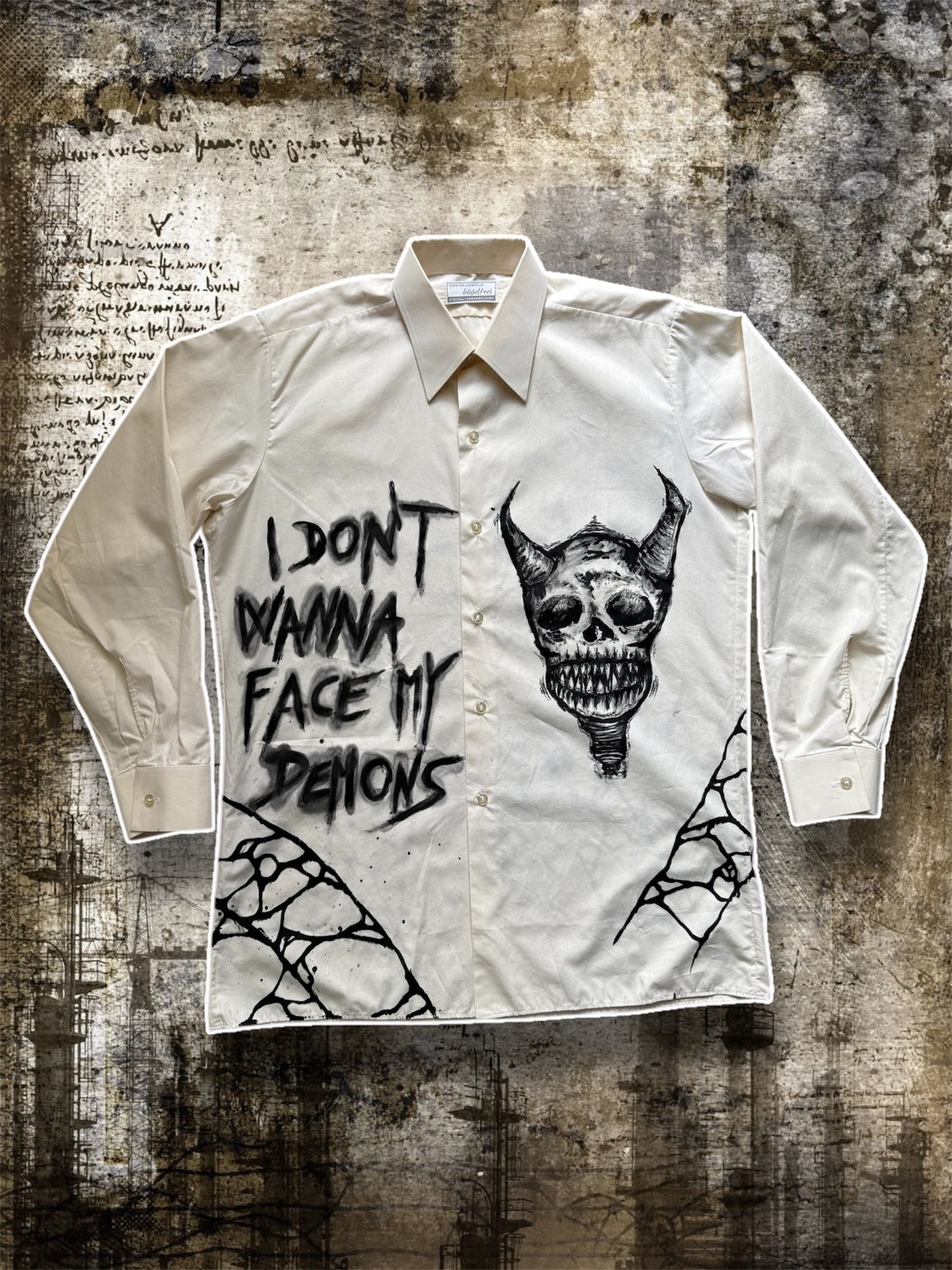 “FACING DEMONS” painted shirt