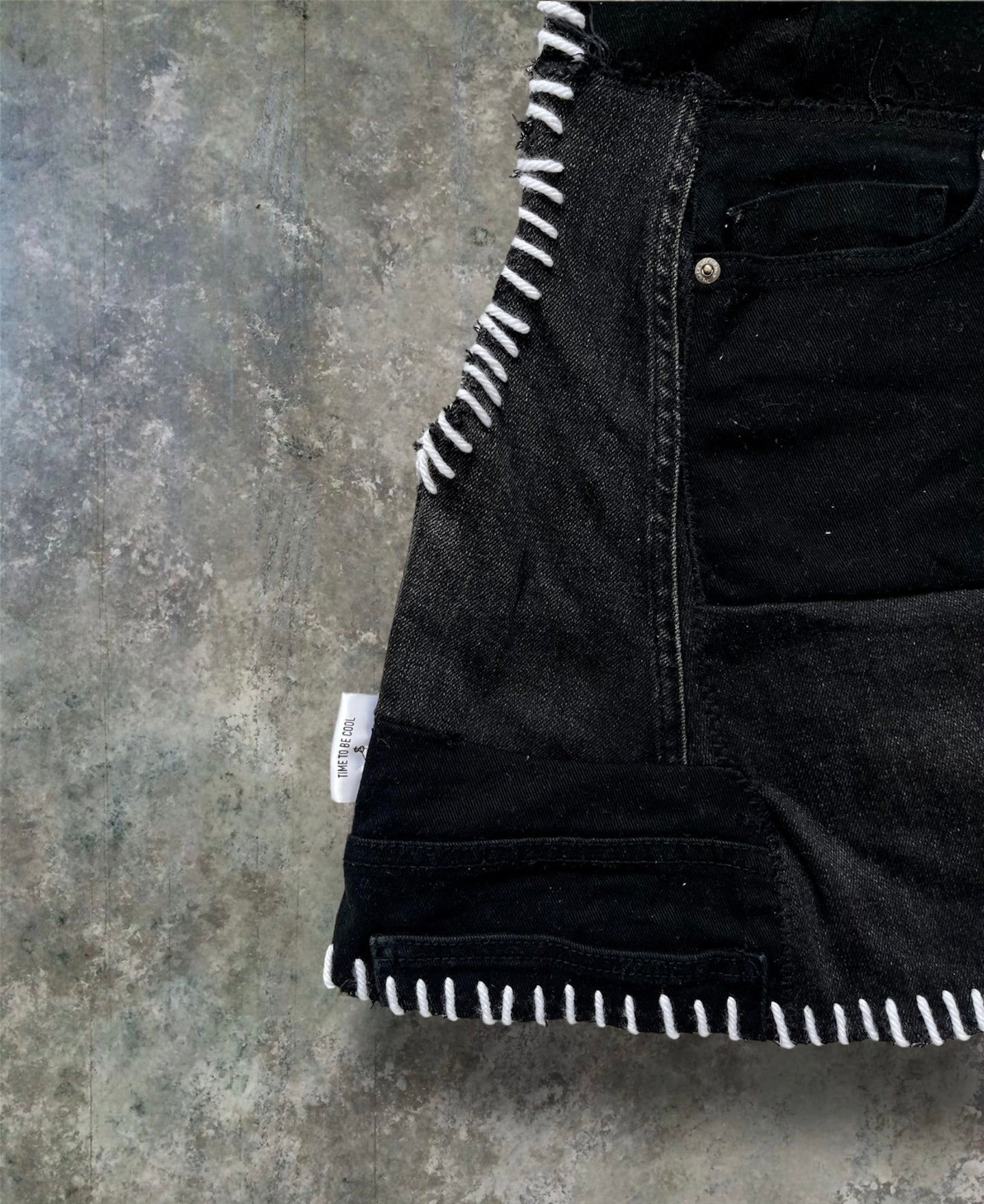 Upcycled denim top with print and embroidery