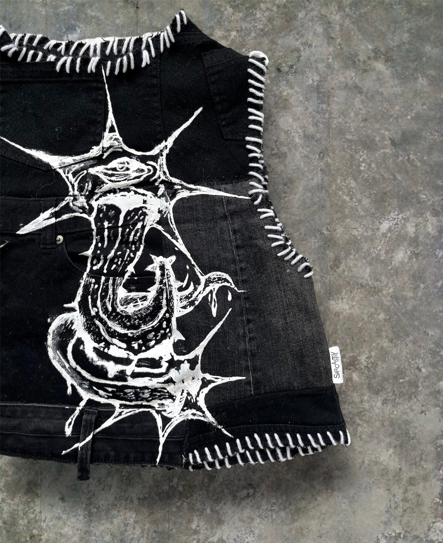 Upcycled denim top with print and embroidery