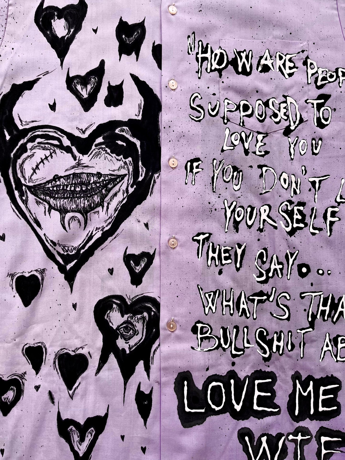 “LOVE ME ANYWAY” purple shirt