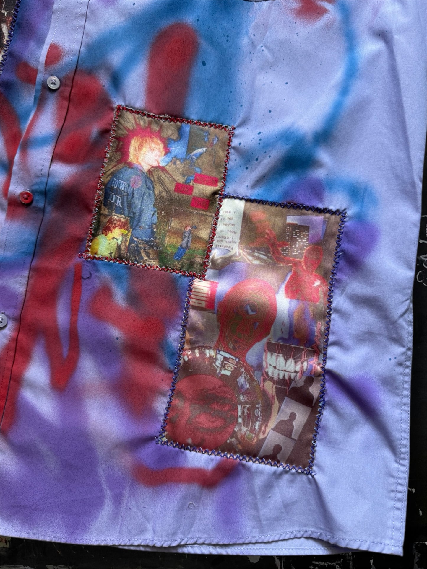 Sprayed purple shirt with art pictures