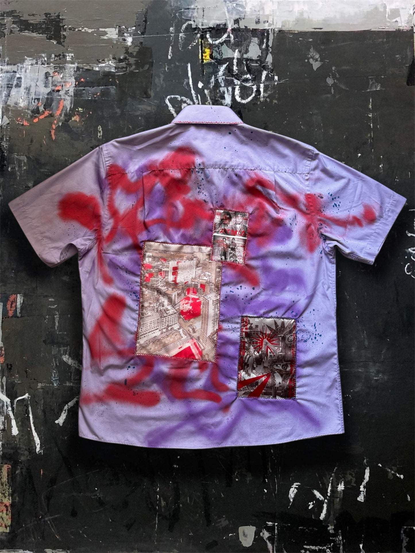 Sprayed purple shirt with art pictures