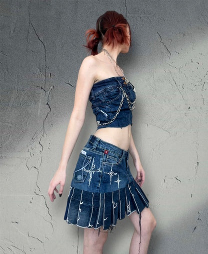 Pleated denim skirt with 3D art