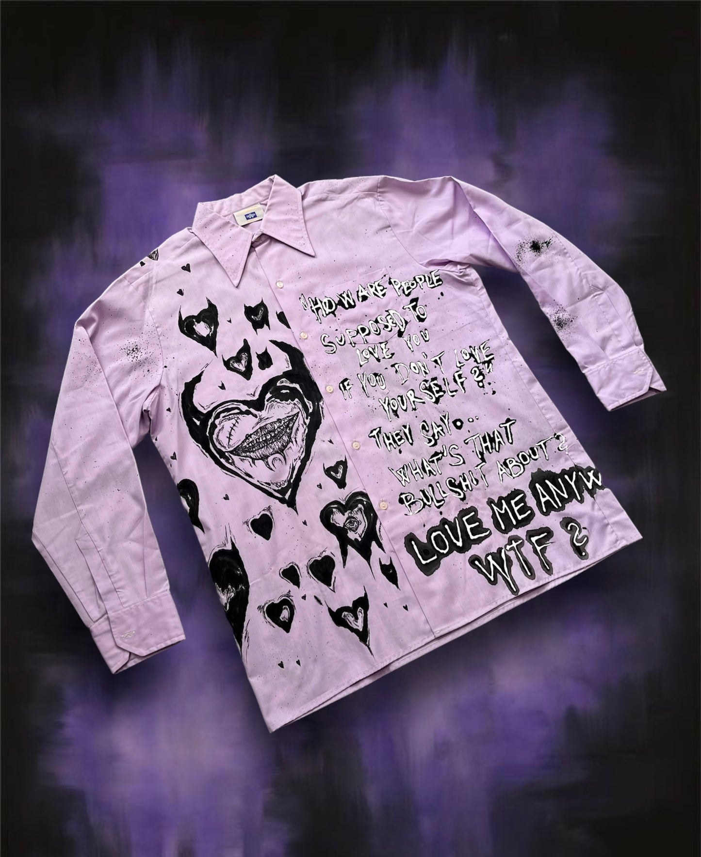 “LOVE ME ANYWAY” purple shirt