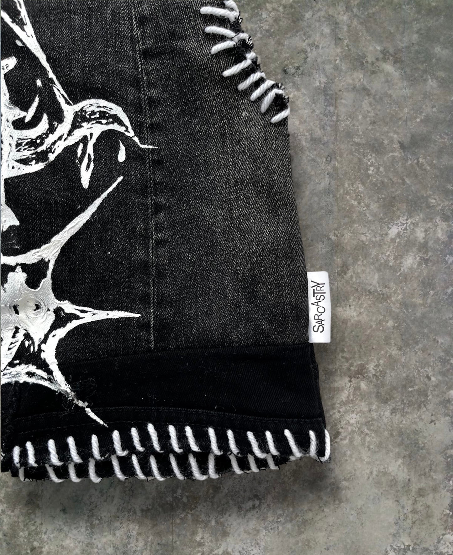 Upcycled denim top with print and embroidery