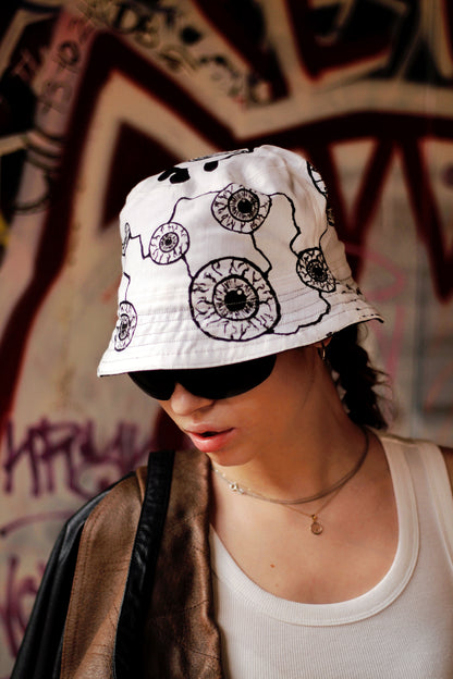 Double-sided/reversible bucked hat with hand painted/bleached elements