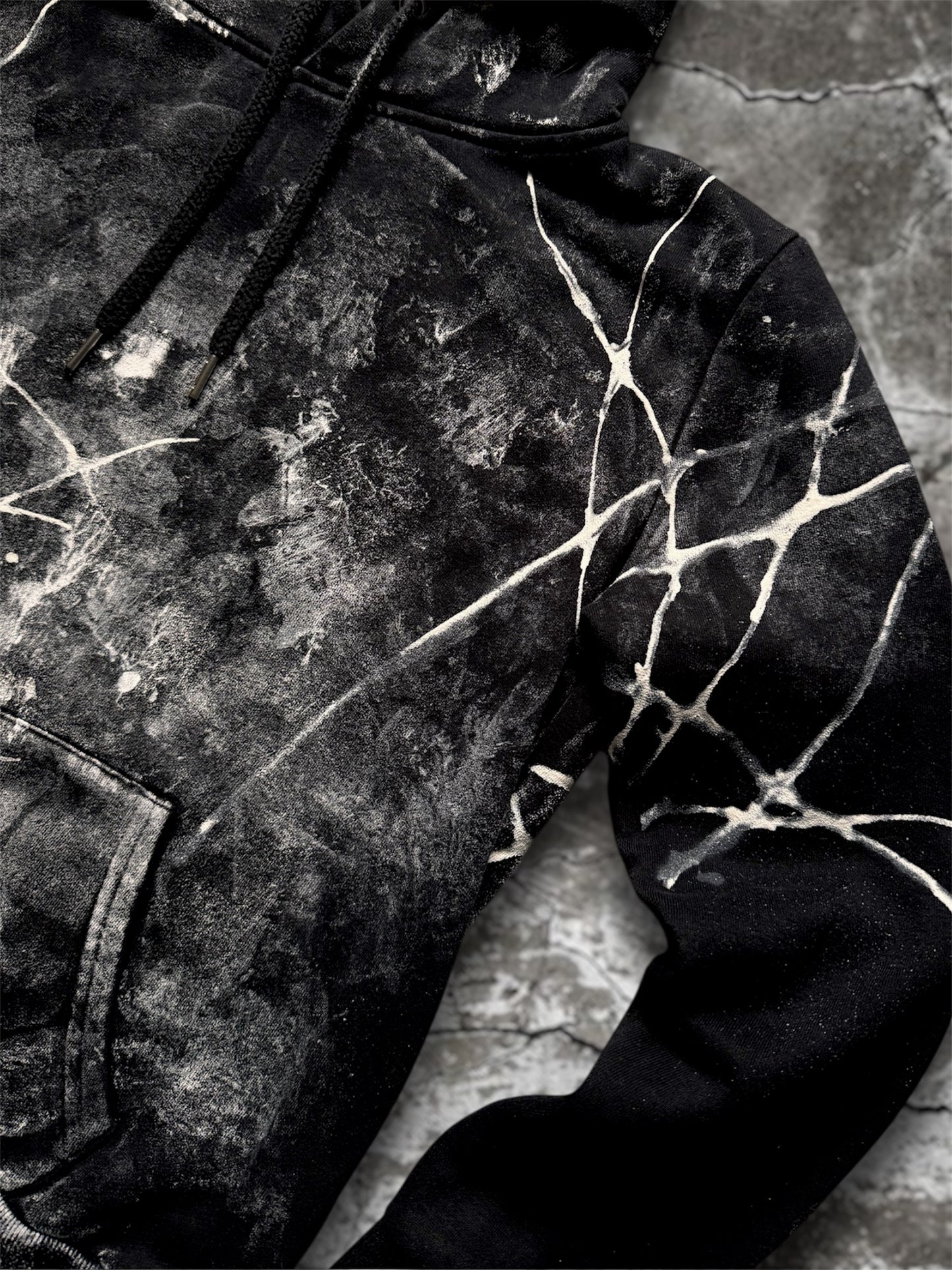 “Webs” hand painted black hoodie