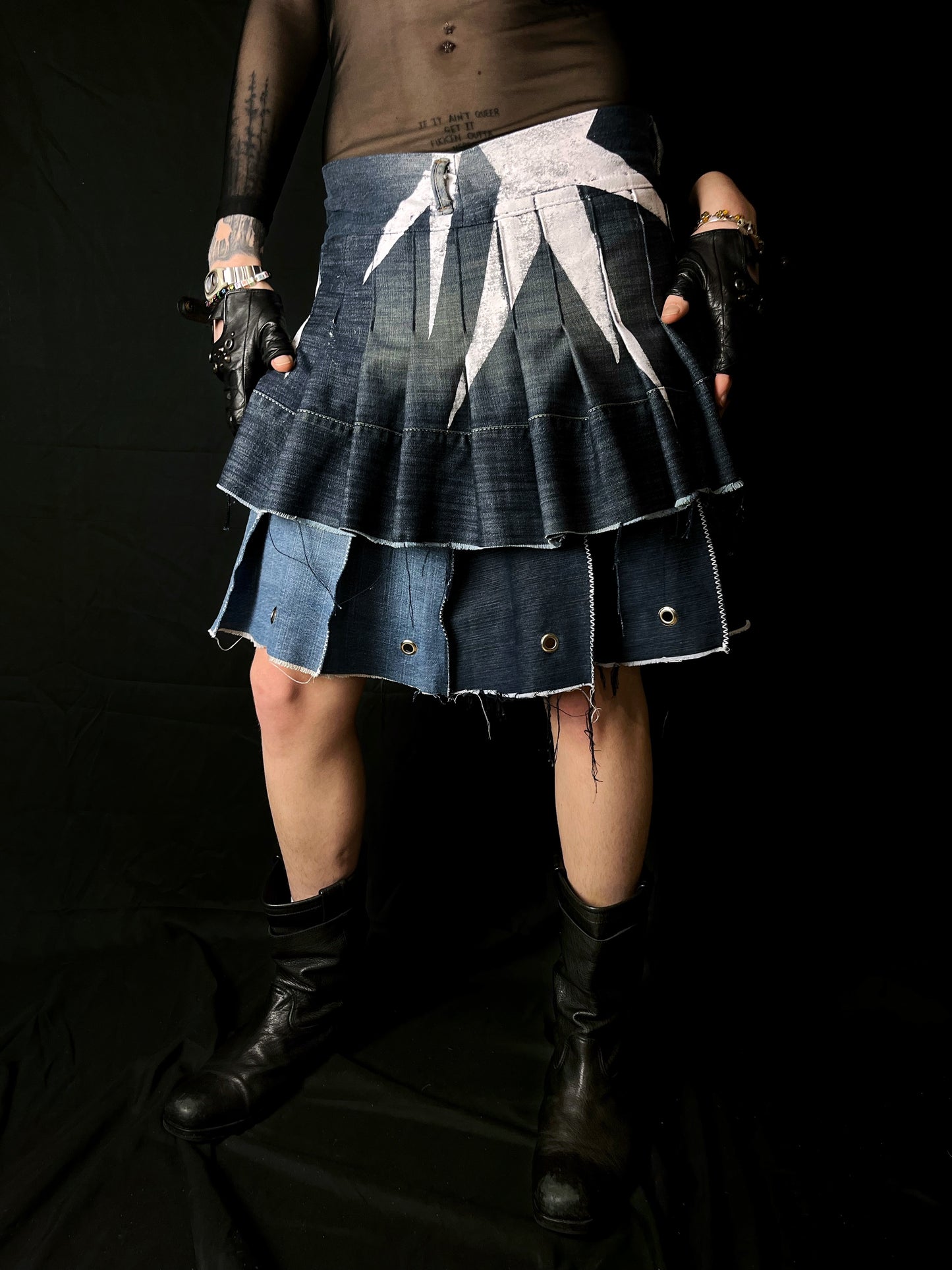 Adjustable pleated denim skirt made of repurposed materials