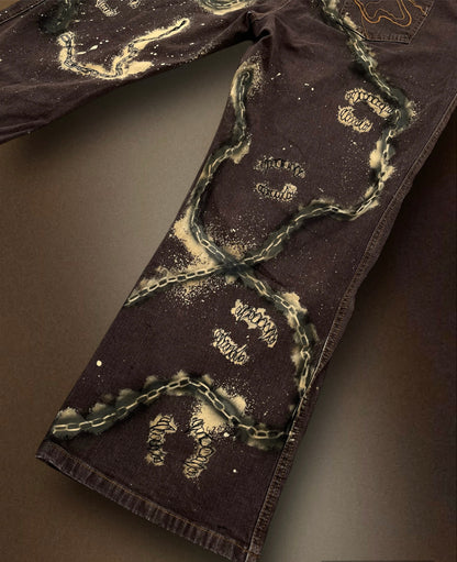 “Teeth chains” bleached brown trousers