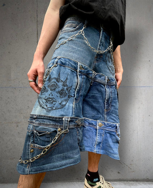 Baggy mid calf jeans with chains and drawings