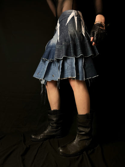 Adjustable pleated denim skirt made of repurposed materials