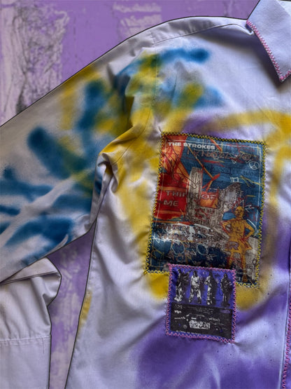 Sprayed light purple shirt with art pictures