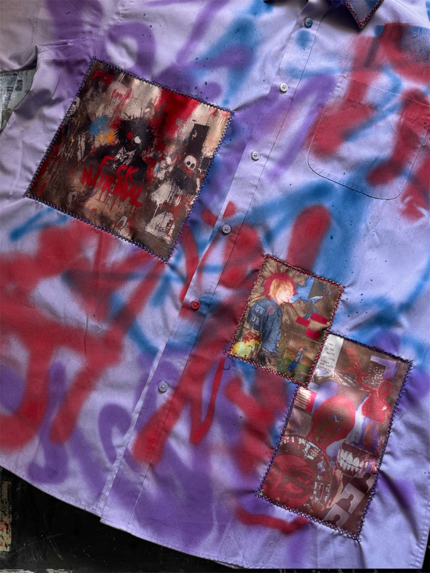 Sprayed purple shirt with art pictures