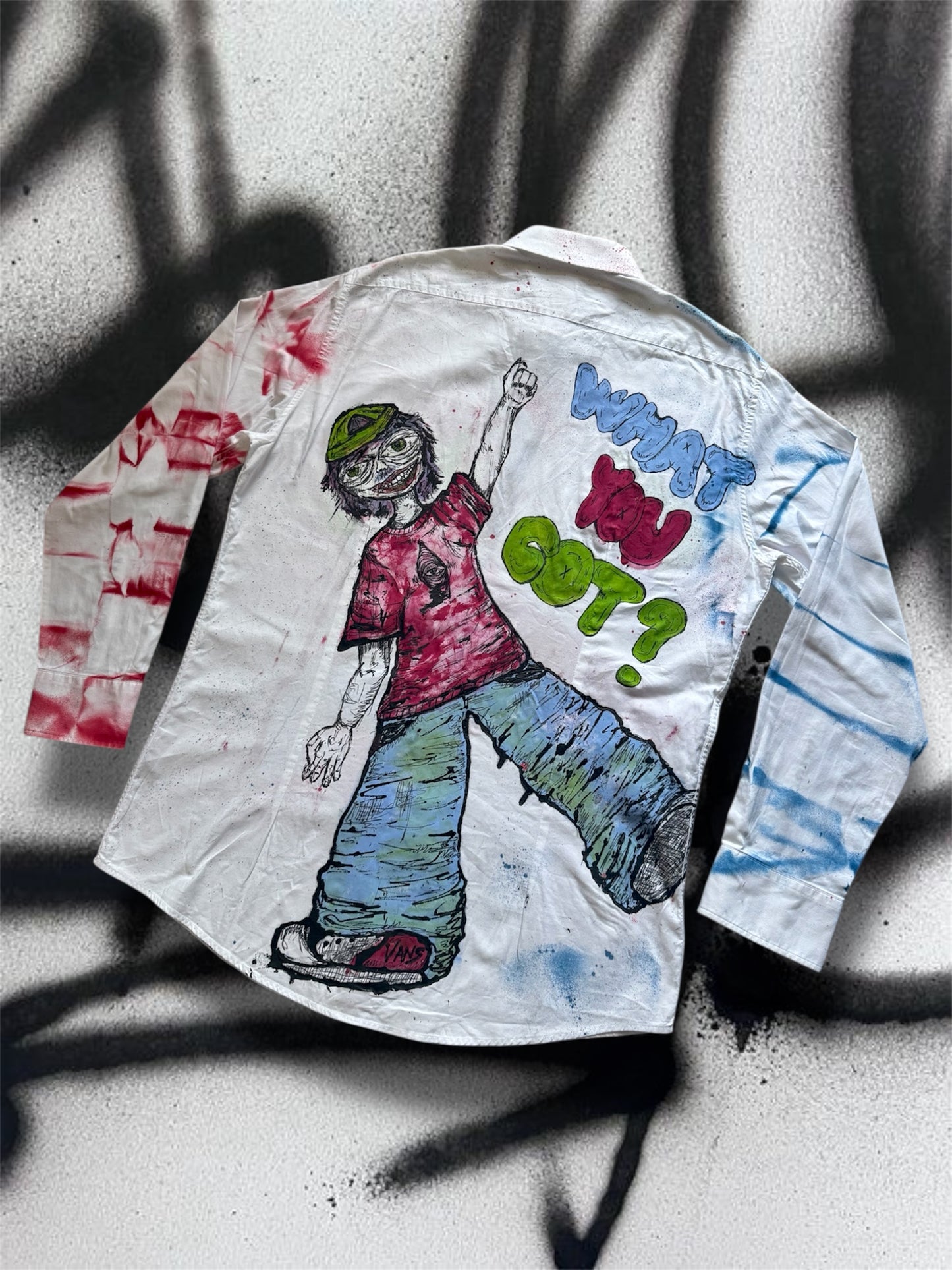 “What you got?” Handpainted shirt