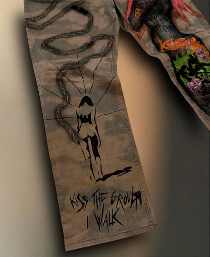 “Kiss the ground” hand painted trousers