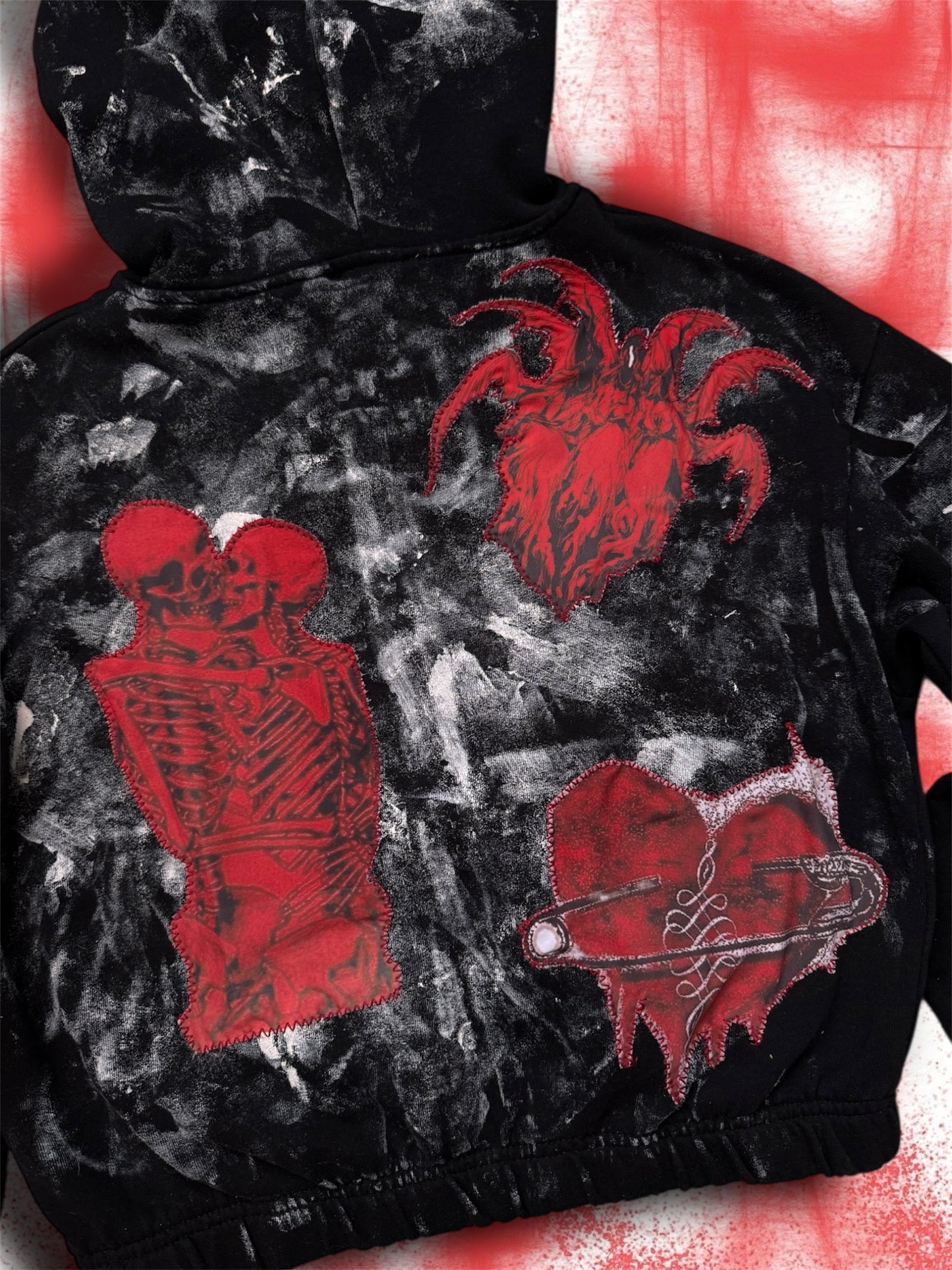 “Bleeding angels” upcycled black hoodie