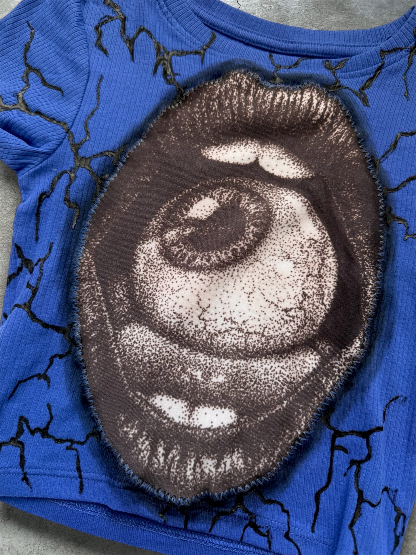 Blue crop top with eye design