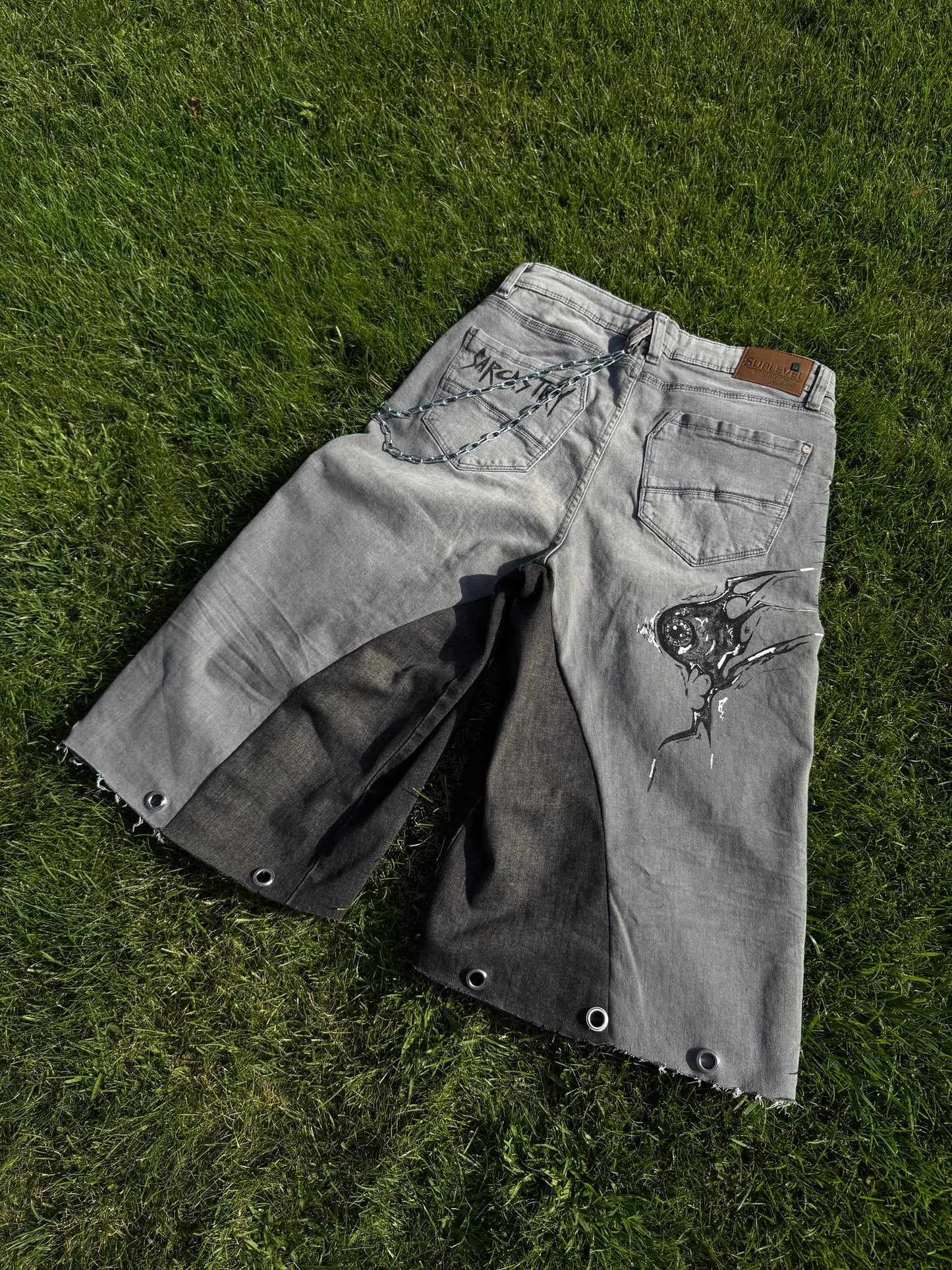 “Sharpeye” upcycled hand painted jorts