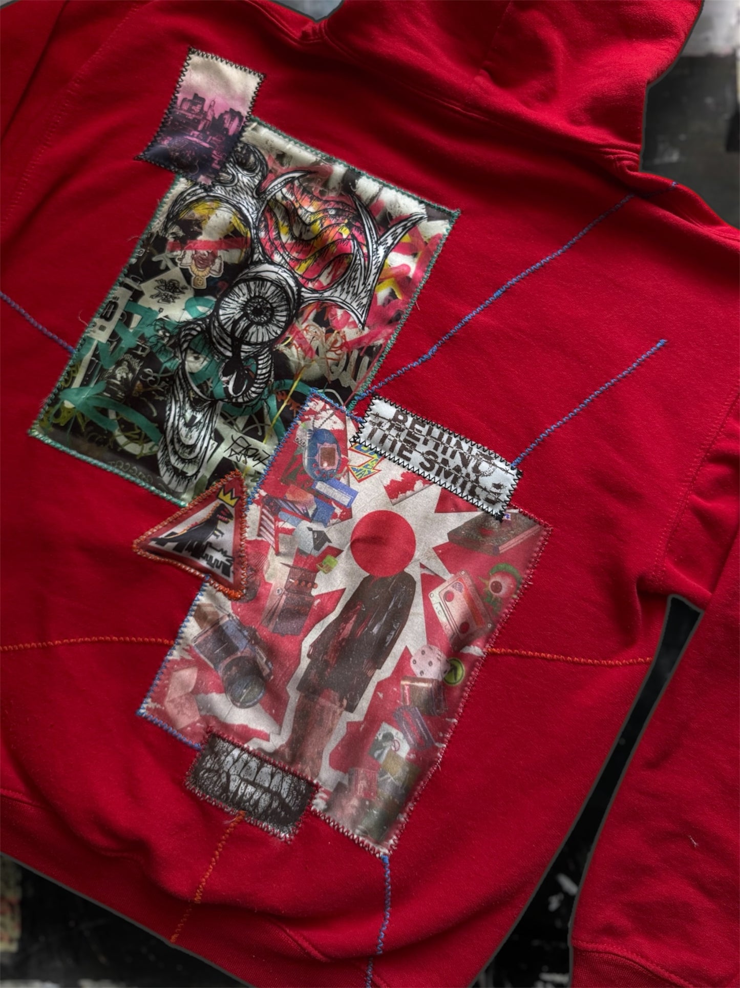 “George” red hoodie with stitched art