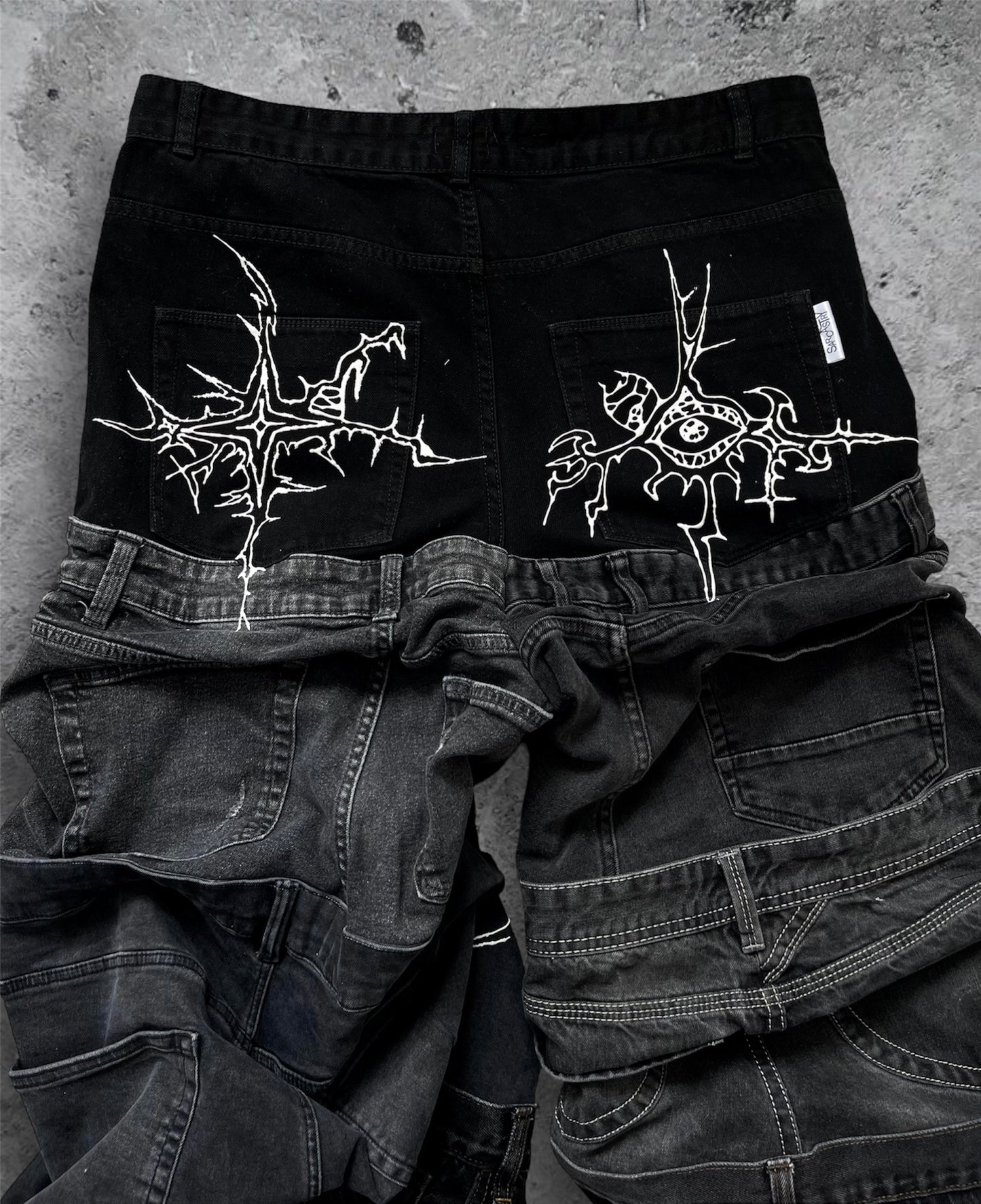 “Enchanted” 1 of 1 baggy draped jeans with 3D designs
