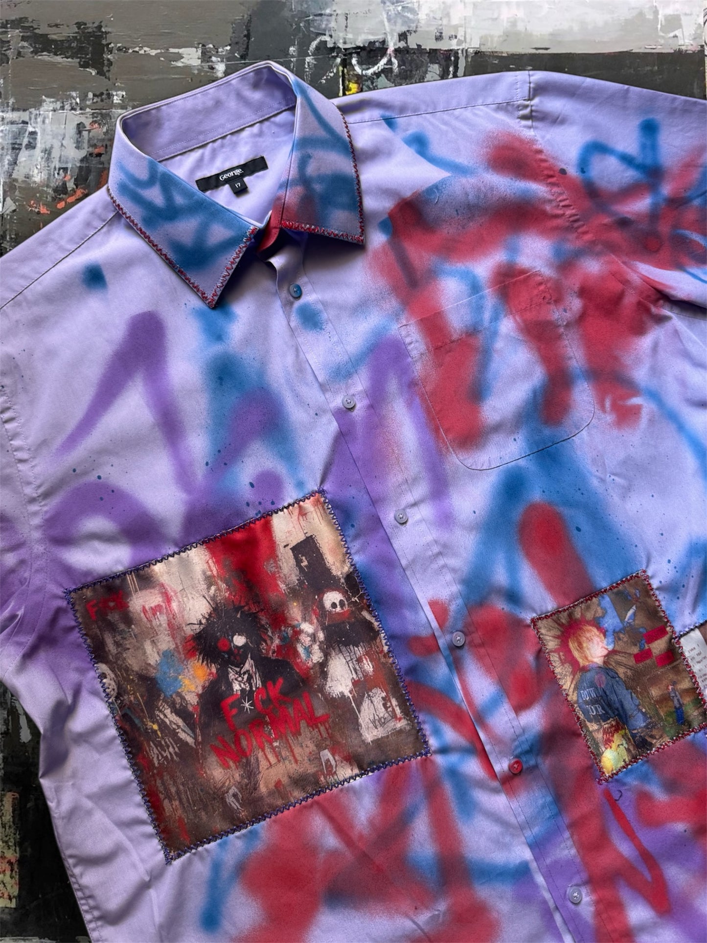 Sprayed purple shirt with art pictures