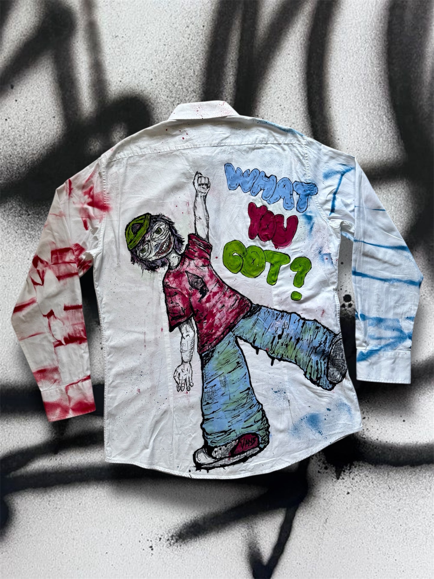 “What you got?” Handpainted shirt