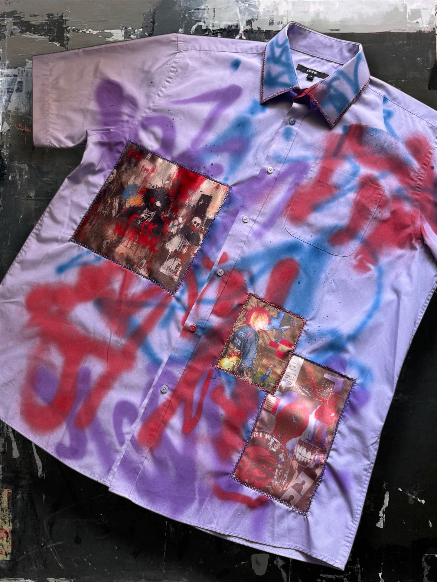 Sprayed purple shirt with art pictures