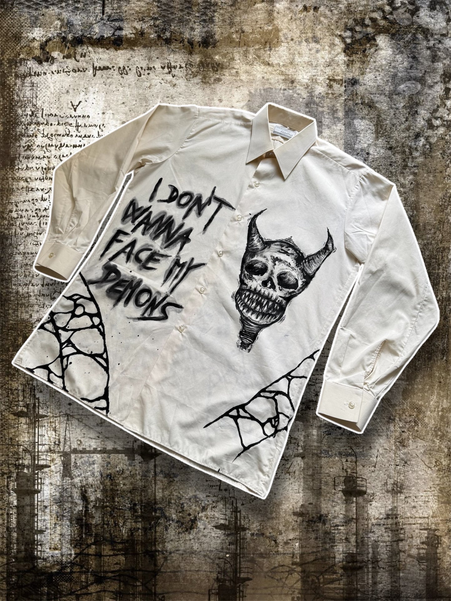 “FACING DEMONS” painted shirt
