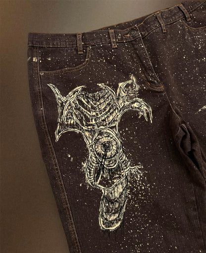 “Teeth chains” bleached brown trousers