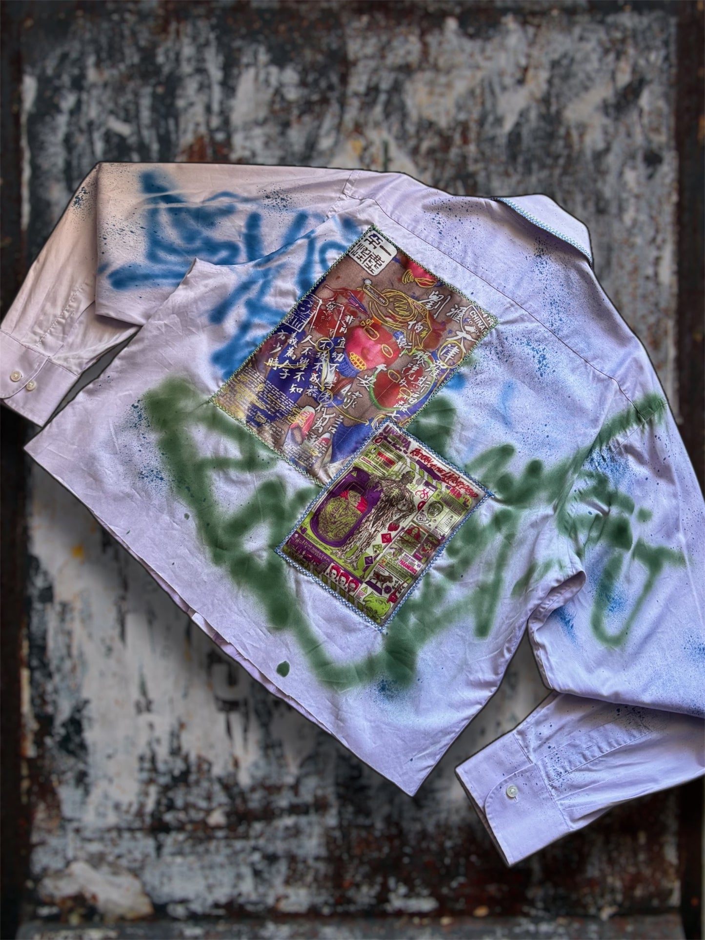 Sprayed light purple shirt with art pictures