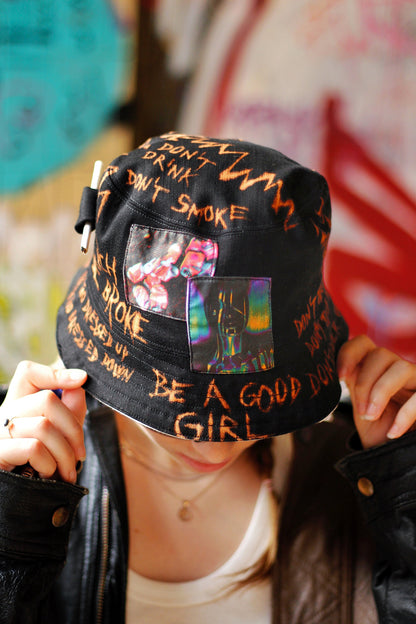 Double-sided/reversible bucked hat with hand painted/bleached elements