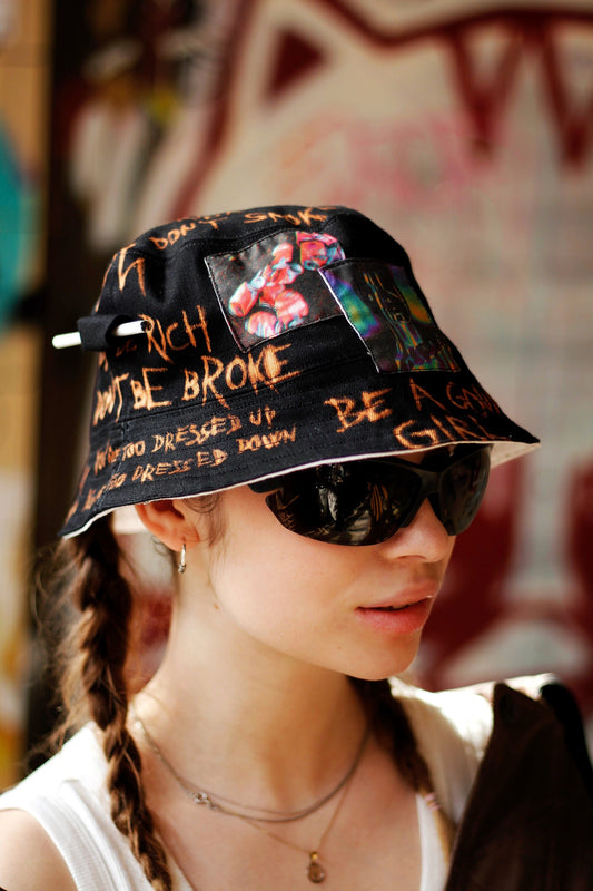 Double-sided/reversible bucked hat with hand painted/bleached elements