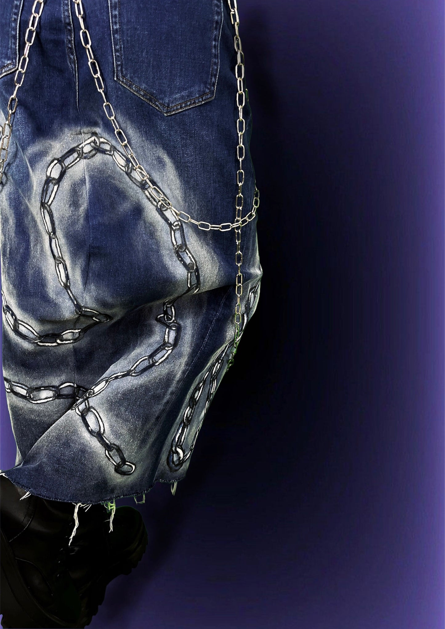 Repurposed denim skirt with chains and chain design