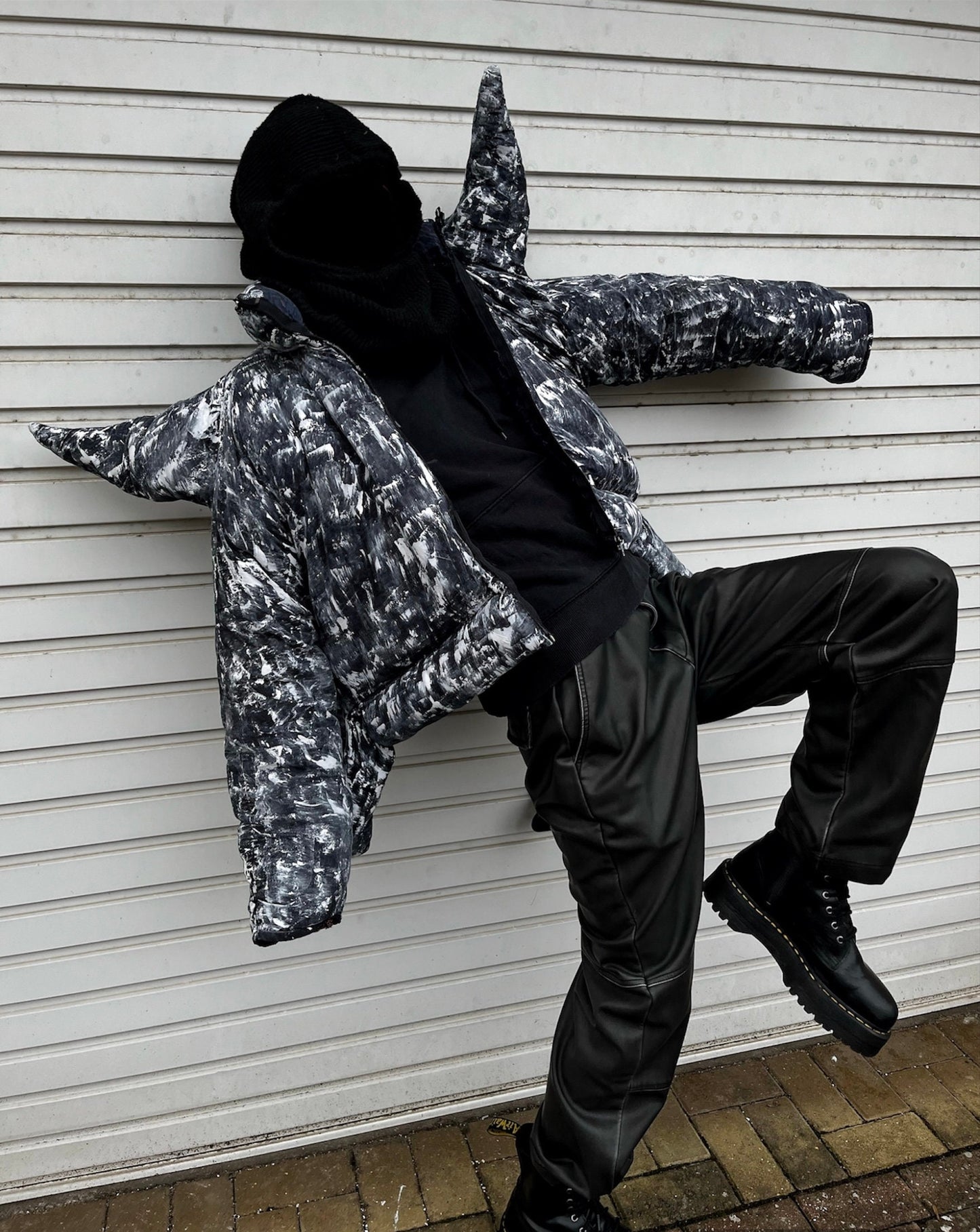 Puffer jacket with spikes made of old duvet