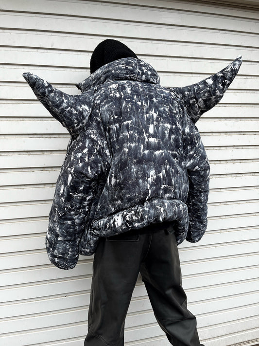 Puffer jacket with spikes made of old duvet