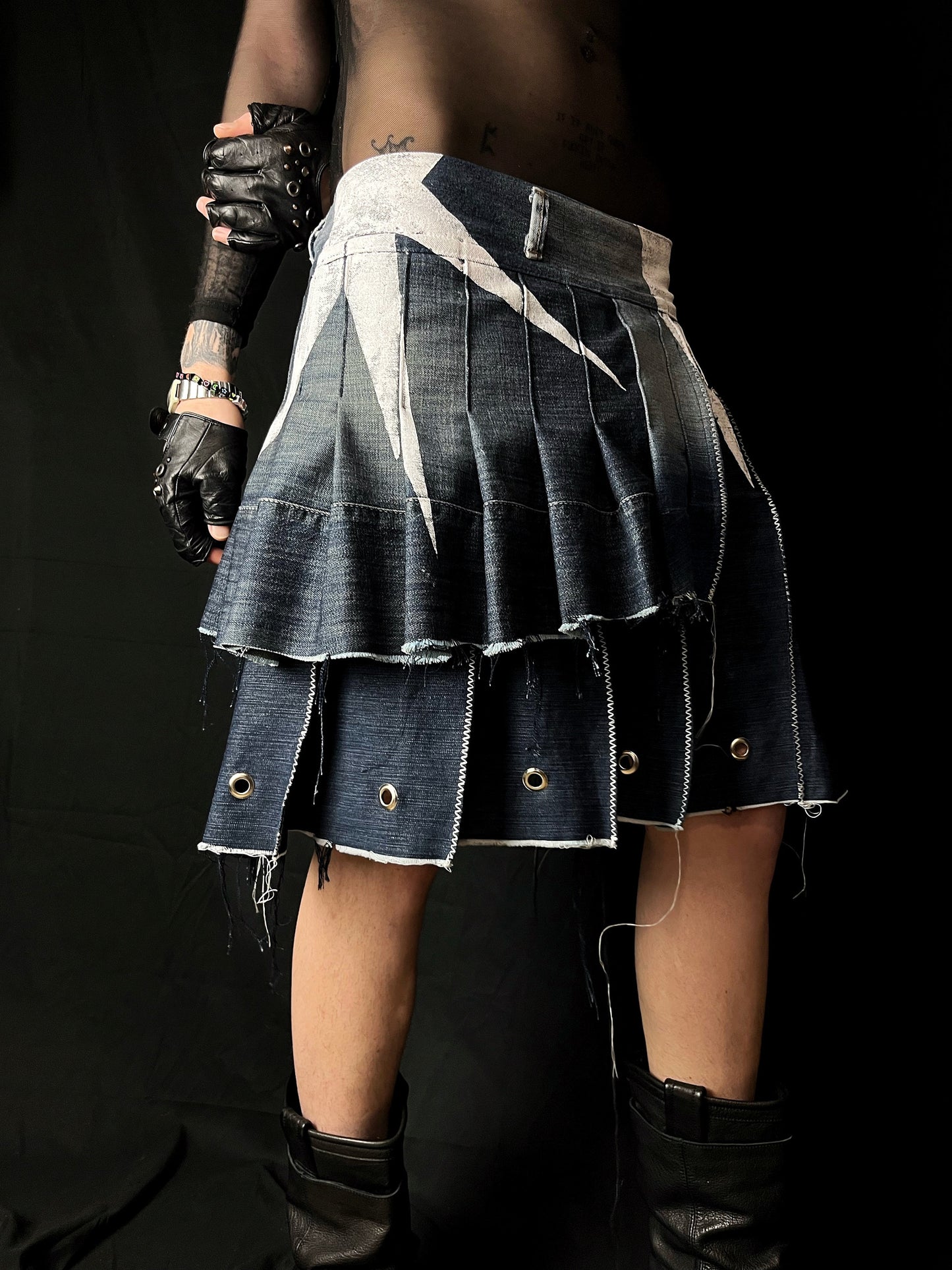 Adjustable pleated denim skirt made of repurposed materials