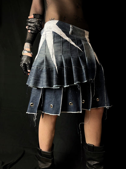 Adjustable pleated denim skirt made of repurposed materials