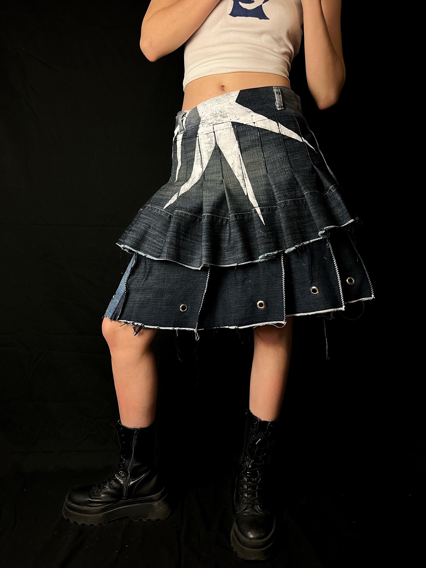 Adjustable pleated denim skirt made of repurposed materials