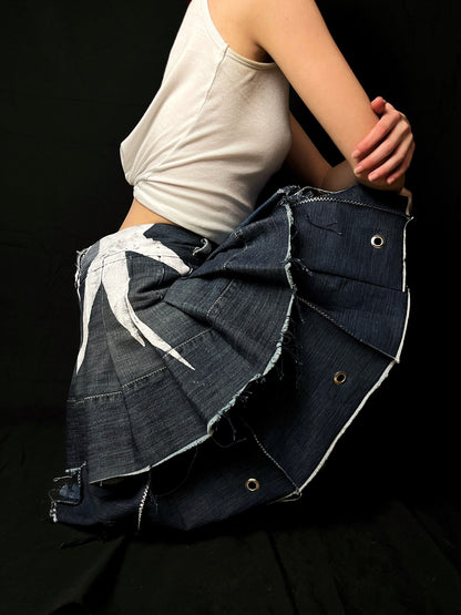Adjustable pleated denim skirt made of repurposed materials