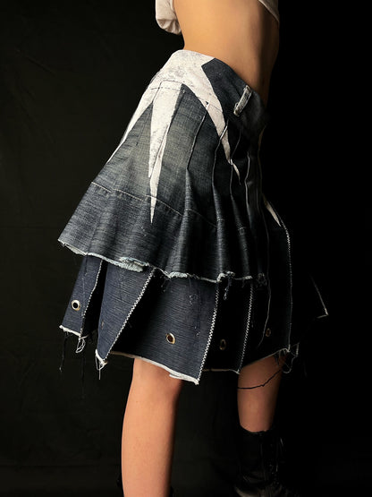 Adjustable pleated denim skirt made of repurposed materials