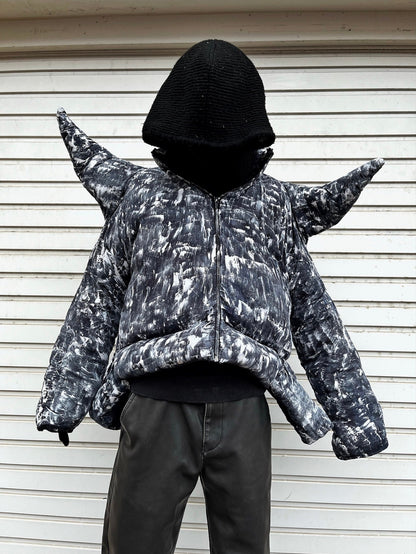 Puffer jacket with spikes made of old duvet