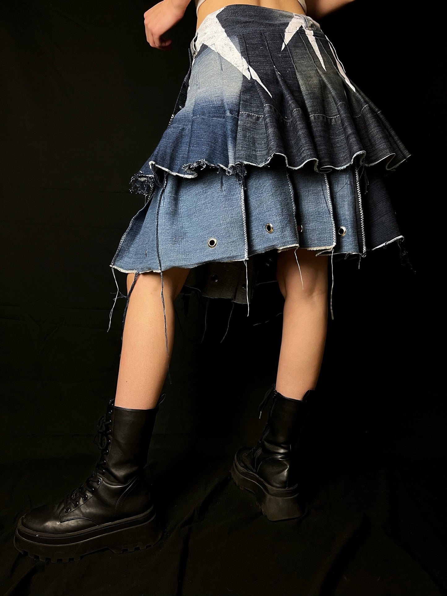 Adjustable pleated denim skirt made of repurposed materials