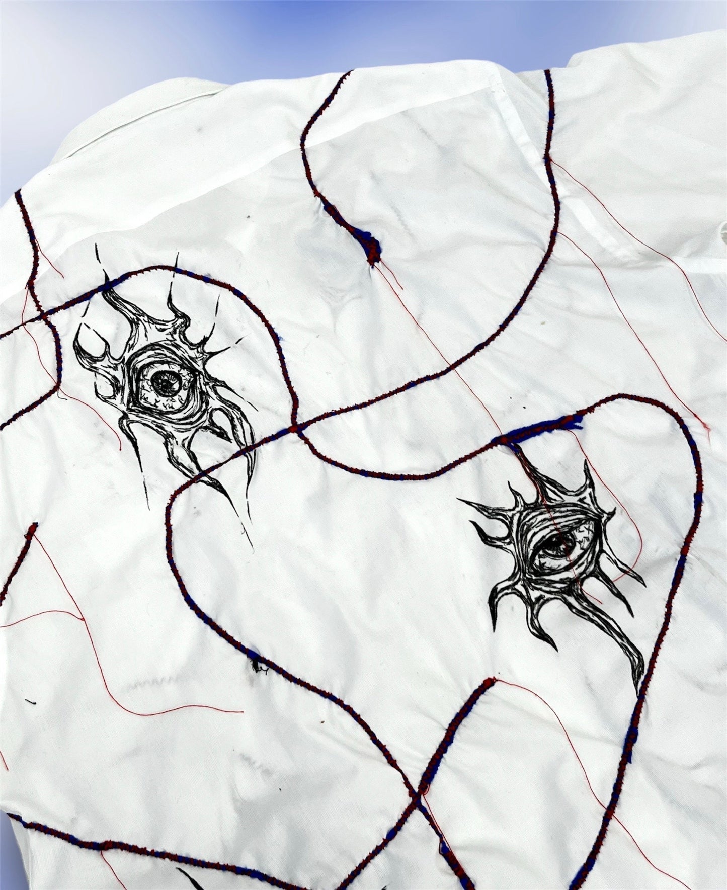 Upcycled custom white shortsleeved shirt/hand drawn eyes/blue elastic stripes stitched with red thread