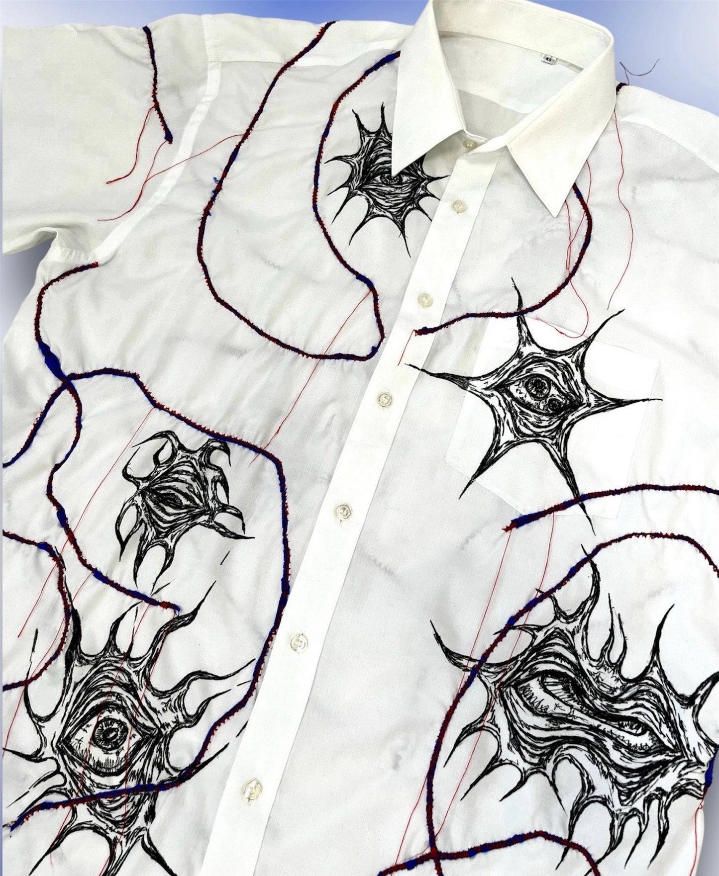 Upcycled custom white shortsleeved shirt/hand drawn eyes/blue elastic stripes stitched with red thread