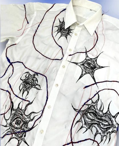 Upcycled custom white shortsleeved shirt/hand drawn eyes/blue elastic stripes stitched with red thread