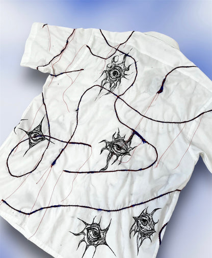 Upcycled custom white shortsleeved shirt/hand drawn eyes/blue elastic stripes stitched with red thread